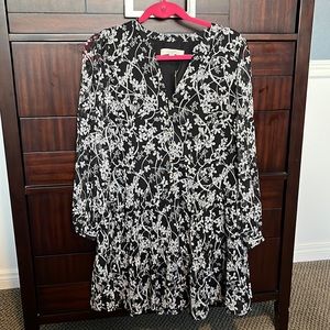 It’s a black floral dress has never been worn. Size small from The Loft